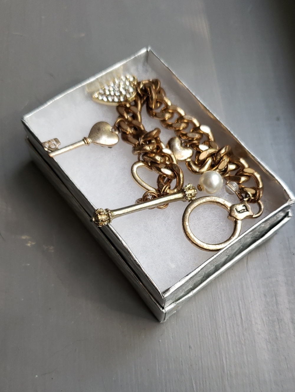 Juicy Couture charm bracelet 8in gold tone